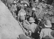 Carrying wounded through the trenches 1915