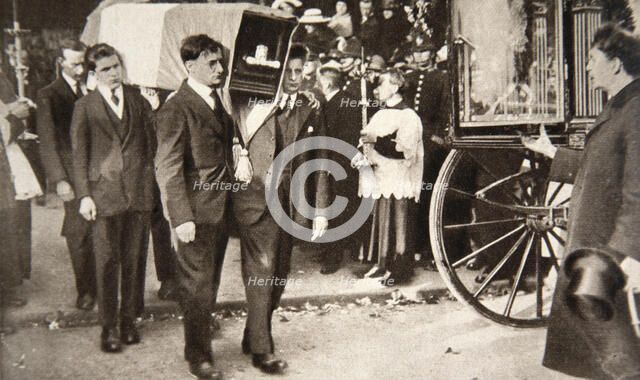 Carrying the coffin of Alderman Terence McSwiney, Lord Mayor of Cork, 1920. Artist: S and G