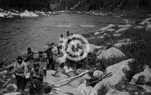 Carrying the Heavy Load of a Land-Management Expedition, Detouring the Mrassu River Rapid, 1913. Creator: GI Ivanov.
