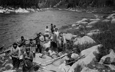 Carrying the Heavy Load of a Land-Management Expedition, Detouring the Mrassu River Rapid, 1913. Creator: GI Ivanov