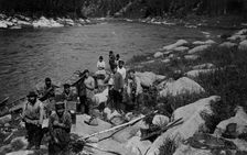 Carrying the Heavy Load of a Land-Management Expedition, Detouring the Mrassu River Rapid, 1913. Creator: GI Ivanov