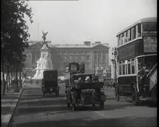 Cars And Buses Travelling Towards Buckingham Palace, 1927. Creator: British Pathe Ltd