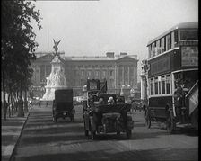 Cars And Buses Travelling Towards Buckingham Palace, 1927. Creator: British Pathe Ltd