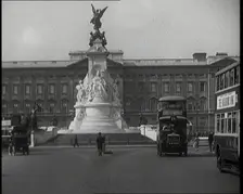 Cars And Buses Travelling at the Roundabout in Front of Buckingham Palace, 1927. Creator: British Pathe Ltd