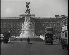 Cars And Buses Travelling at the Roundabout in Front of Buckingham Palace, 1927. Creator: British Pathe Ltd