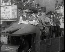 Cars, Buses and Pedestrians Arriving for the 1920 Epsom Derby, 1920. Creator: British Pathe Ltd