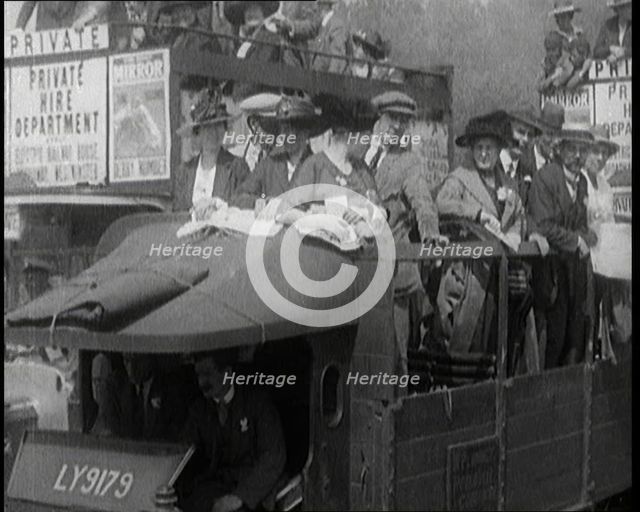 Cars, Buses and Pedestrians Arriving for the 1920 Epsom Derby, 1920. Creator: British Pathe Ltd.
