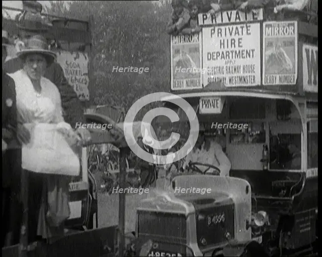 Cars, Buses and Pedestrians Arriving for the 1920 Epsom Derby, 1920. Creator: British Pathe Ltd.