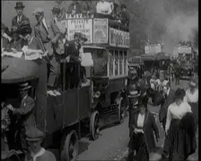 Cars, Buses and Pedestrians Arriving for the 1920 Epsom Derby, 1920. Creator: British Pathe Ltd