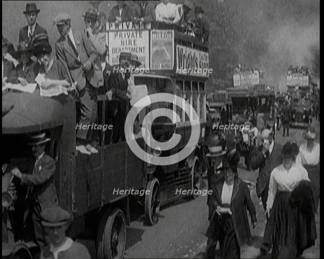Cars, Buses and Pedestrians Arriving for the 1920 Epsom Derby, 1920. Creator: British Pathe Ltd.