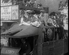 Cars, Buses and Pedestrians Arriving for the 1920 Epsom Derby, 1920. Creator: British Pathe Ltd