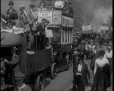 Cars, Buses and Pedestrians Arriving for the 1920 Epsom Derby, 1920. Creator: British Pathe Ltd