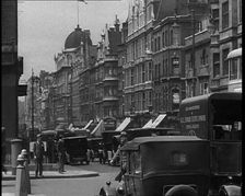 Cars Driving Through London, 1936. Creator: British Pathe Ltd