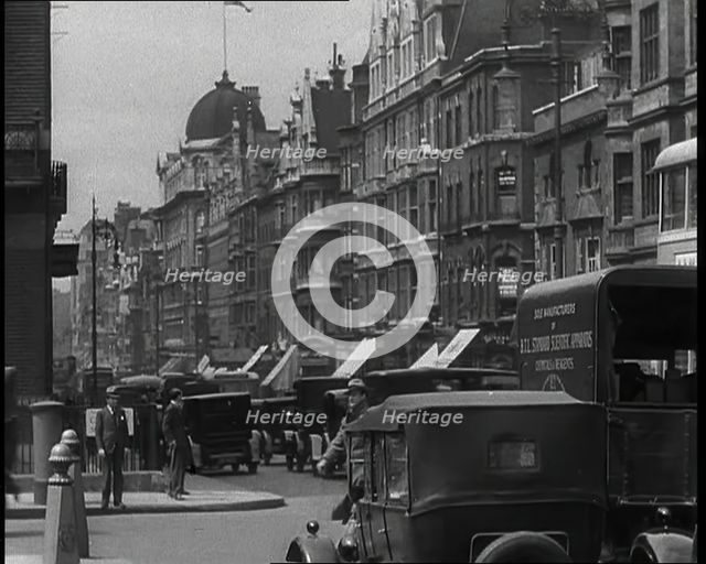 Cars Driving Through London, 1936. Creator: British Pathe Ltd.