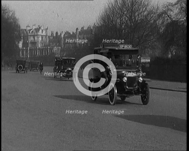 Cars in Traffic in a Busy Road, 1920. Creator: British Pathe Ltd.