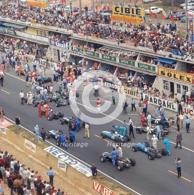 Cars lining up on the starting grid, French Grand Prix, Le Mans, France, 1967. Artist: Unknown