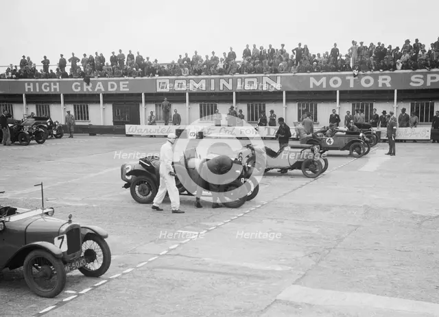 Cars on the start line at the JCC Members Day, Brooklands, 4 July 1931. Artist: Bill Brunell.
