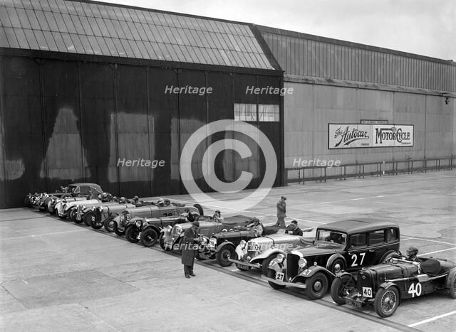 Cars on the start line at the JCC Members' Day, Brooklands, 8 July 1939. Artist: Bill Brunell.