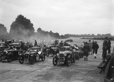 Cars on the starting grid for the Brighton & Hove Motor Club High Speed Trial, Brooklands, c1931. Artist: Bill Brunell