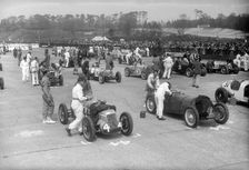 Cars on the starting grid for the JCC International Trophy, Brooklands, 2 May 1936. Artist: Bill Brunell