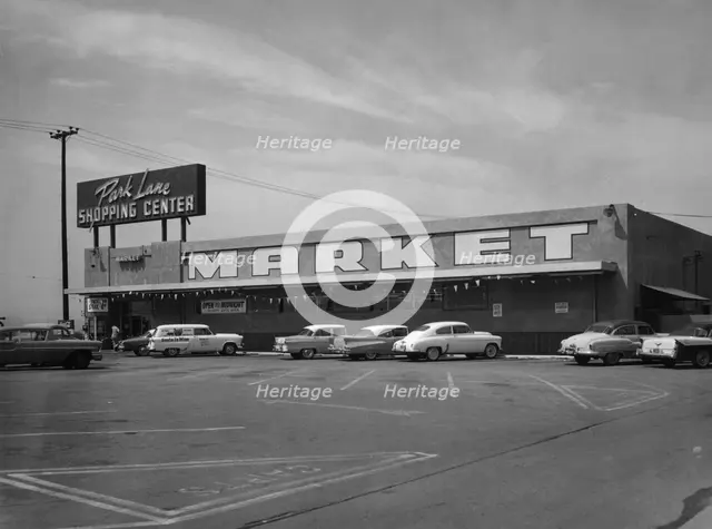 Cars parked outside a supermarket, USA, c1956. Artist: Unknown