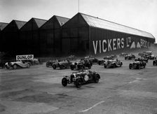 Cars racing at the MCC Members Meeting, Brooklands, 10 September 1938. Artist: Bill Brunell