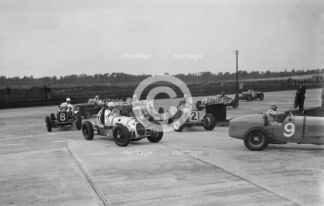 Cars racing at the BARC Meeting on the Campbell Circuit, Brooklands, 15 October 1938. Artist: Bill Brunell.