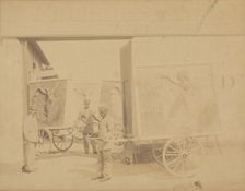 Carts with Folies Bergère posters, 1893. Creator: Loie Fuller