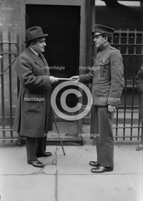 Caruso greets a marine, between c1915 and c1920. Creator: Bain News Service.
