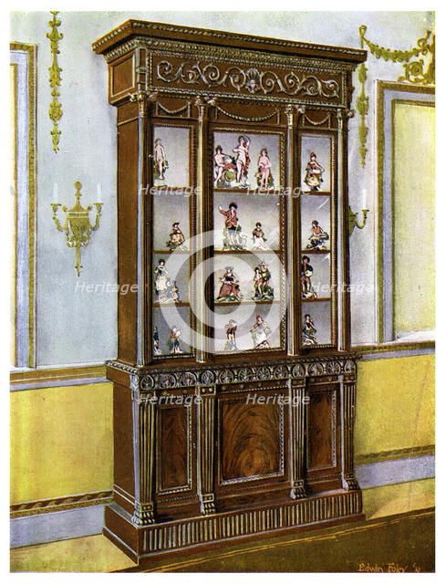 Carved mahogany china case influenced by the Adam Brothers, 1911-1912.Artist: Edwin Foley