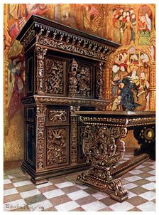 Carved oak armoire, 1910.Artist: Edwin Foley