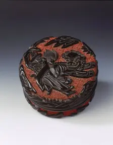 Carved black lacquer covered box on red ground, Ming dynasty, China, late 15th-early 16th century. Creator: Unknown