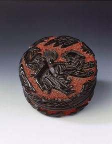 Carved black lacquer covered box on red ground, Ming dynasty, China, late 15th-early 16th century