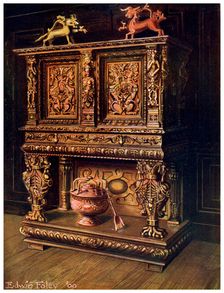 Carved Bourgouignon credence, 1910.Artist: Edwin Foley