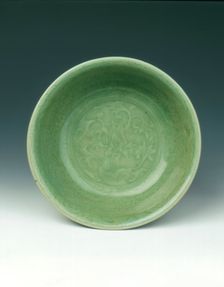 Carved celadon bowl, early Ming dynasty, China, 15th century. Creator: Unknown