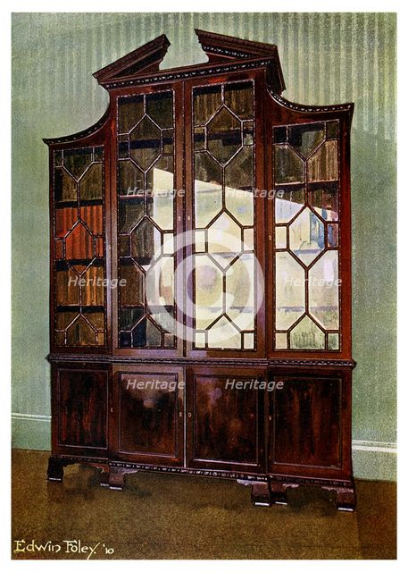 Carved Chippendale library bookcase, 1911-1912.Artist: Edwin Foley