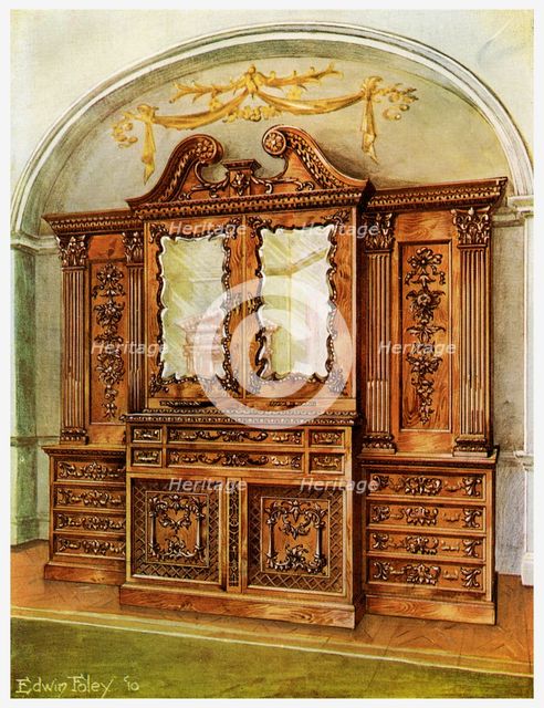 Carved enclosed mahogany bookcase, style of Chippendale, French influence, 1911-1912.Artist: Edwin Foley
