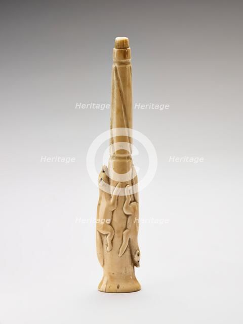 Carved harpoon foreshaft with two running foxes carved in relief, 1880-1920. Creator: Unknown.