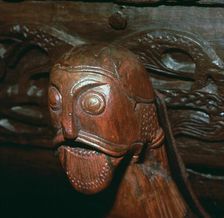 Carved head detail from a cart in the Oseburg Viking ship burial, 9th century
