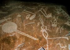Carved Petroglyph (People, deers, elks, birds, boots and circles), 4th-3rd millenium BC
