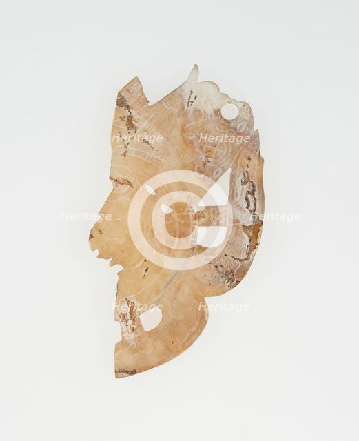 Carved Shell Depicting the Profile Face of Diety (Broken), A.D. 250/900. Creator: Unknown.