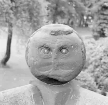 Carved Victorian stone head on a garden wall, Speke Hall, Liverpool, Merseyside, c1945-c1980. Artist: Eric de Maré