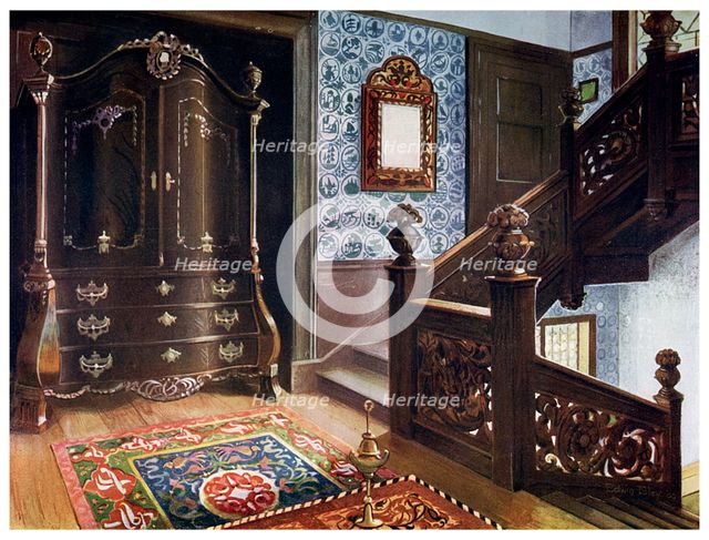 Carved walnut bombe armoire with chased mounts, 1910.Artist: Edwin Foley