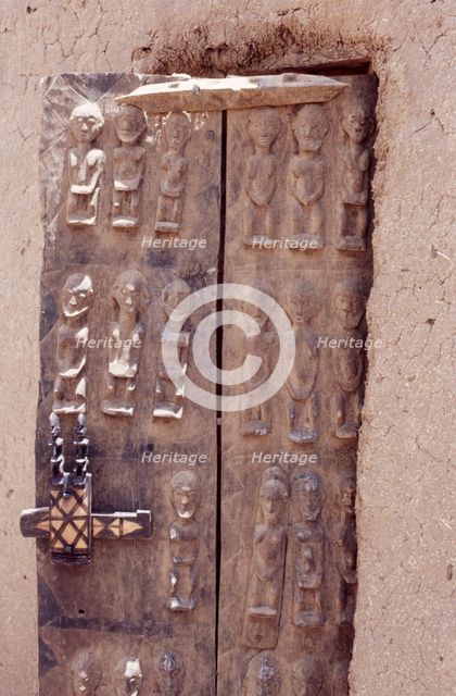 Carved wooden door, Pays Dogon, Mali, 1990. Creator: Amanda Waite.