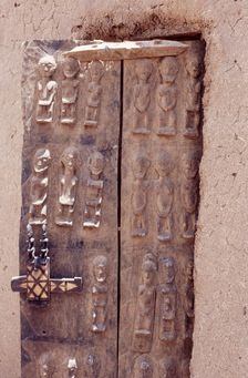 Carved wooden door, Pays Dogon, Mali, 1990. Creator: Amanda Waite