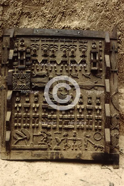 Carved wooden door, Pays Dogon, Mali, 1990. Creator: Amanda Waite.