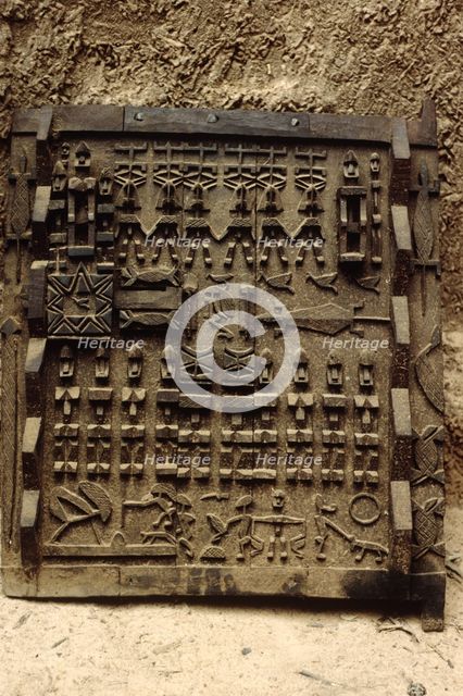 Carved wooden door, Pays Dogon, Mali, 1990. Creator: Amanda Waite.