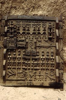 Carved wooden door, Pays Dogon, Mali, 1990. Creator: Amanda Waite