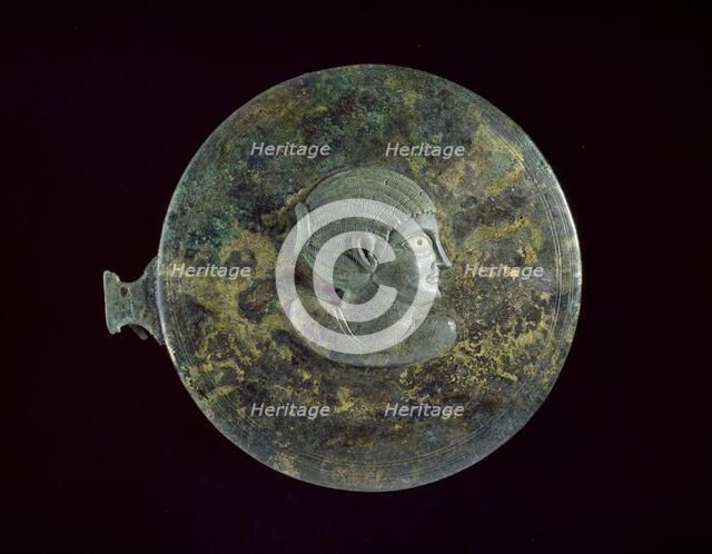 Cast bronze mirror-cover with bust of a woman in relief, 1st century BC - 1st century AD. Artist: Unknown.