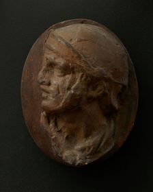 Cast of the head of Roman soldier in helmet and scarf with raised right arm. Creator: Unknown